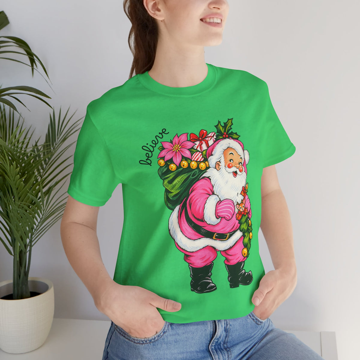 Pink Santa Christmas T-Shirt — Retro Holiday Santa Carrying Poinsettias Tee