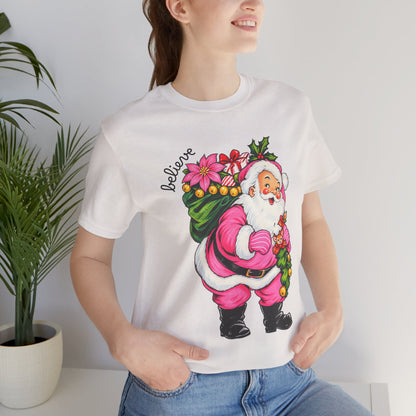 Pink Santa Christmas T-Shirt — Retro Holiday Santa Carrying Poinsettias Tee