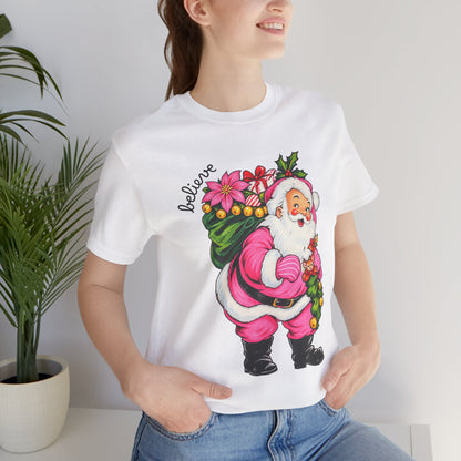 Pink Santa Christmas T-Shirt — Retro Holiday Santa Carrying Poinsettias Tee