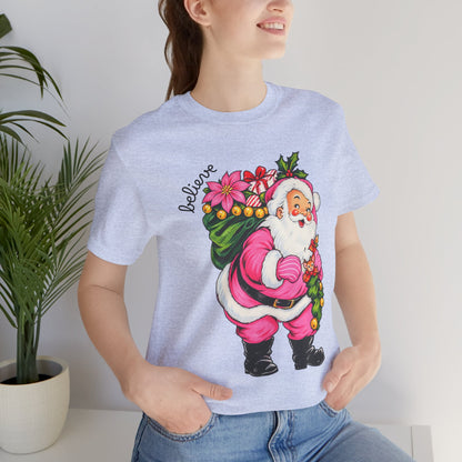 Pink Santa Christmas T-Shirt — Retro Holiday Santa Carrying Poinsettias Tee