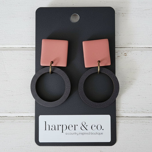Pair of earrings with square clay on a black card with 'harper & co.' branding.