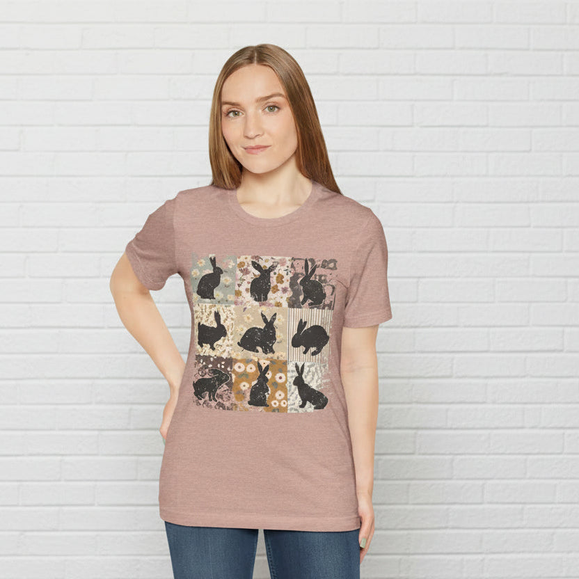 Woman wearing a brown t-shirt with rabbit pattern on a white background