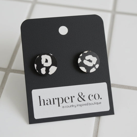Black and white patterned earrings on a 'harper & co.' branded card.
